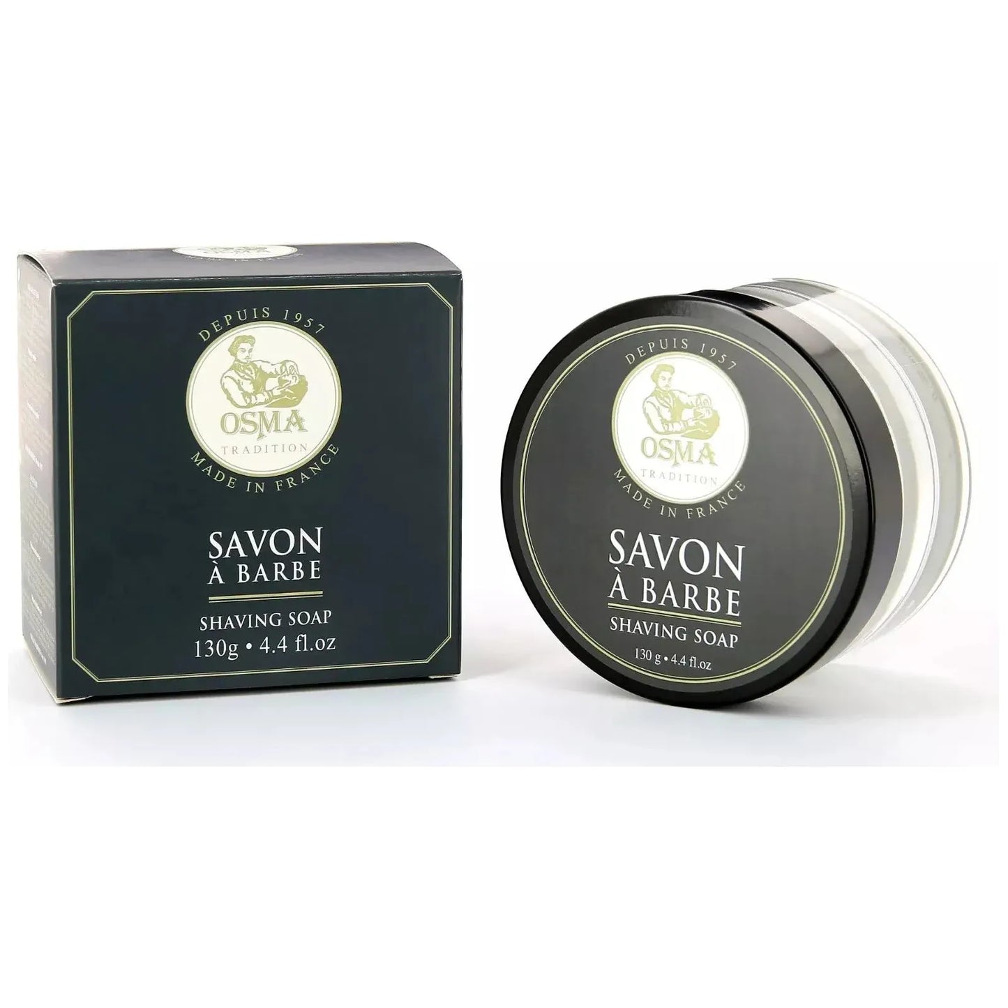 Osma Shea Butter & Vegetable Oils Anniversary Edition shaving soap in a clear glass jar, featuring a rich, creamy lather.