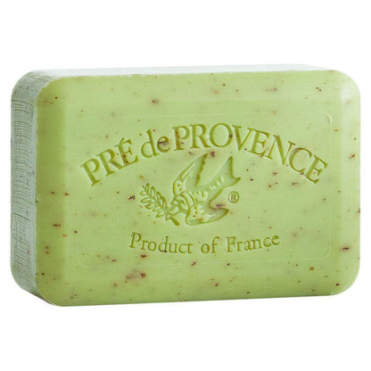 Pre De Provence Lime Zest Shea Butter Enriched Vegetable Soap, 250g, with a bar of soap and lime zest scent on a natural setting.