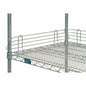 Set of four 72-inch chrome wire shelves with back ledge for storage and display by Pasteur Pharmacy.