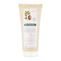 Klorane Ultra Nourishing Shower Cream with Organic Cupuacu Flower in 6.7 oz bottle, creamy texture and floral scent visible.