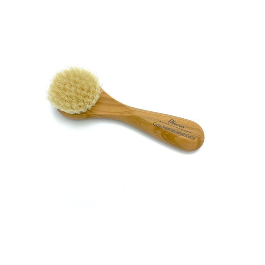 Dural Face & Skin Brush with natural bristles and olive wood handle for gentle cleansing and exfoliation.