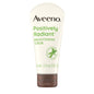 Aveeno Positively Radiant Skin Brightening Daily Scrub in a 2 oz tube, gentle exfoliating skincare product.