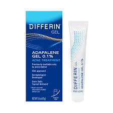 Four tubes of Differin Gel 0.1% acne treatment by Pasteur Pharmacy in retail display case, featuring skincare product for acne.