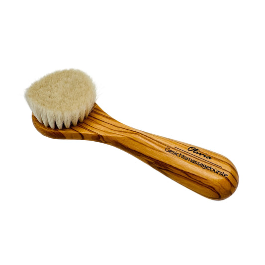 Dural Olivia face and skin brush with natural goats hair and olive wood handle, designed for gentle facial massage and skincare.