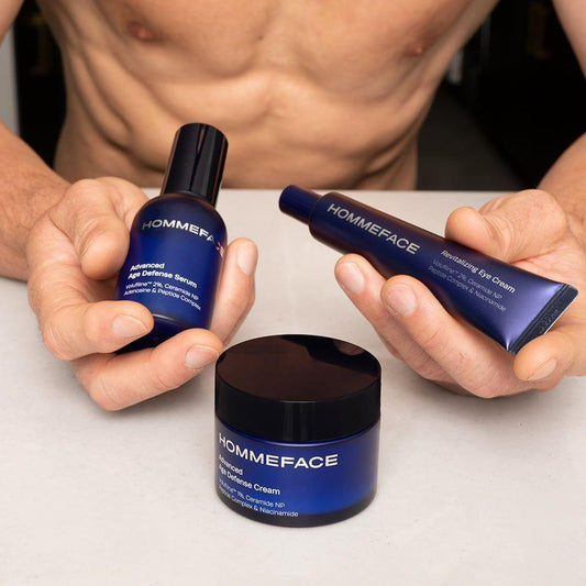 HommeFace Advanced Age Defense skincare set by Pasteur Pharmacy with cleansing, moisturizing, and anti-aging products.