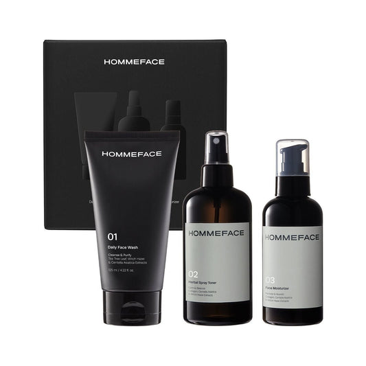 HommeFace Daily Skincare Trio set by Pasteur Pharmacy with cleansers, moisturizers, and serums in 17.74 oz bottles.