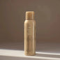 Oribe Flash Form finishing spray wax in 150ml bottle, showcasing sleek packaging and spray nozzle for styling and shine.