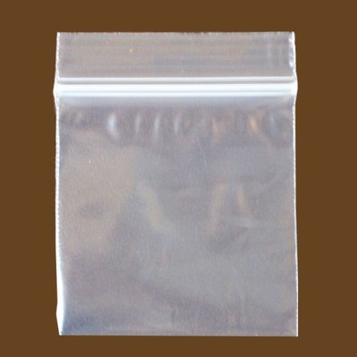Set of 100 clear 3x3-inch zip lock plastic baggies made of 2 mil poly for storage and organization.