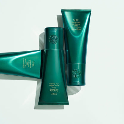 Oribe Styling Butter Curl Enhancing Crème in a jar, creamy styling cream for defined, frizz-free curls and smooth hair.
