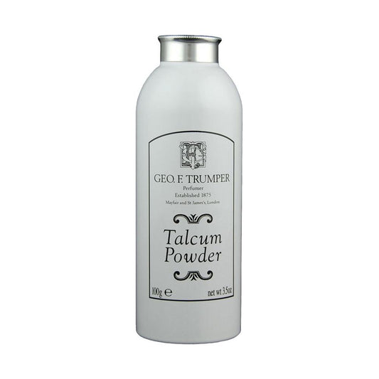Geo. F. Trumper talcum powder in a 100g container, with a white and blue packaging design.