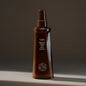 Oribe Maximista Thickening Spray in 200 ml bottle, designed to add volume and body to hair.