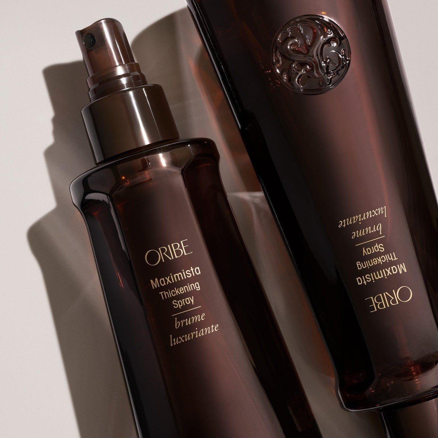 Oribe Maximista Thickening Spray in 200ml bottle, boost volume and fullness for fine hair, natural style and lift.