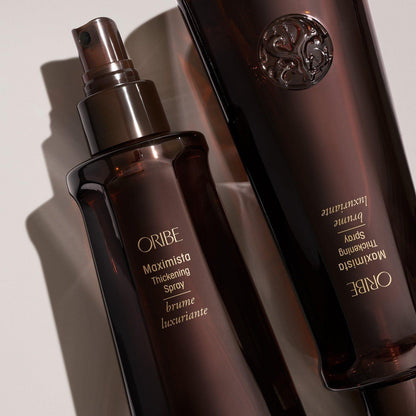 Oribe Maximista Thickening Spray in 200ml bottle, boost volume and fullness for fine hair, natural style and lift.