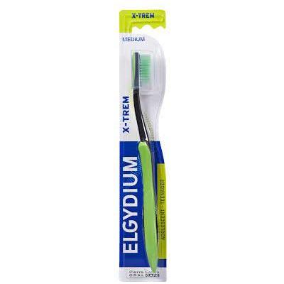 Elgydium X-Trem Teenager Medium Toothbrush by Pasteur Pharmacy with green and white handle and medium bristles.