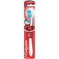 Colgate 360 Optic White full head toothbrush with medium bristles, whitening and tongue cleaner, shown in close-up.