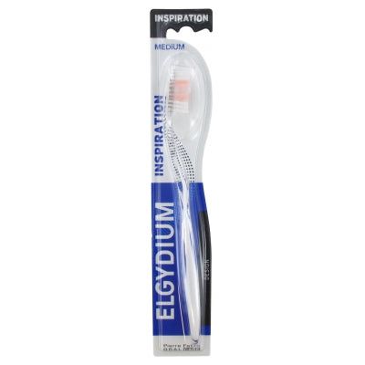 White Elgydium Inspiration Medium toothbrush from Pasteur Pharmacy with ergonomic handle and soft bristles for effective cleaning.