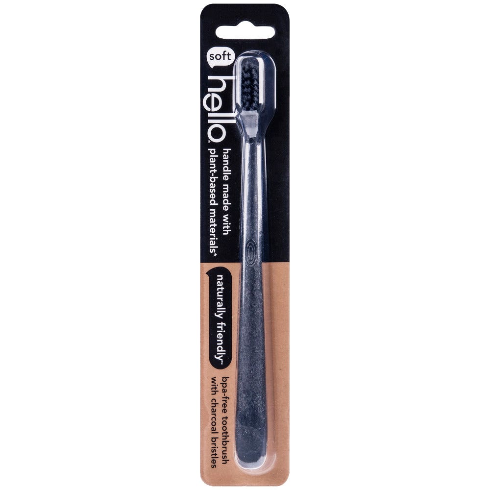 Hello Toothbrush by Pasteur Pharmacy with extra soft charcoal bristles, shown with a sleek handle and toothbrush head.