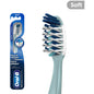Oral-B Cross Action All-In-One manual toothbrush with soft bristles, designed for effective cleaning and gum care.