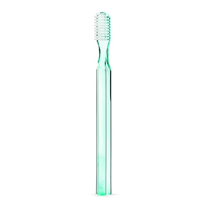 Supersmile New Generation toothbrush with green handle, patented 45° angle soft bristles, designed for gentle, effective cleaning.
