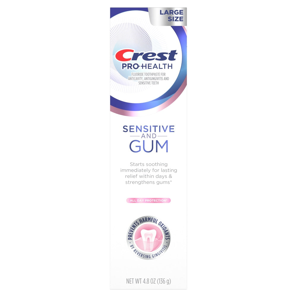 Crest toothpaste for sensitive teeth and gums, all-day protection, large size, in a tube with a white and blue packaging design.