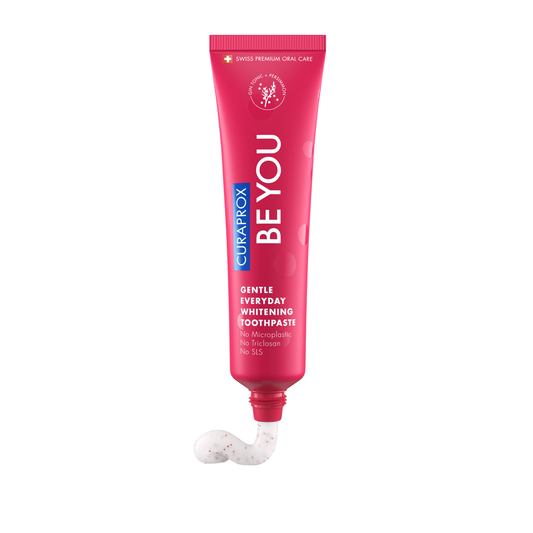 Curaprox Be You Gin Tonic and Persimmon whitening toothpaste in a 60ml tube, designed for fresh breath and bright teeth.