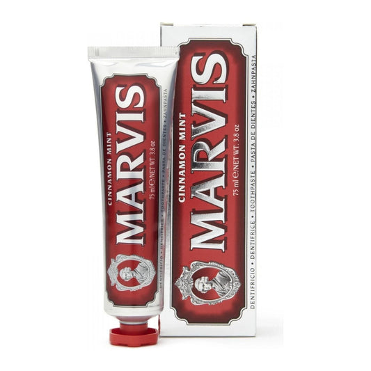 Marvis Cinnamon Mint toothpaste in 3.8 oz tube, featuring a white and colorful packaging with cinnamon and mint flavor branding.