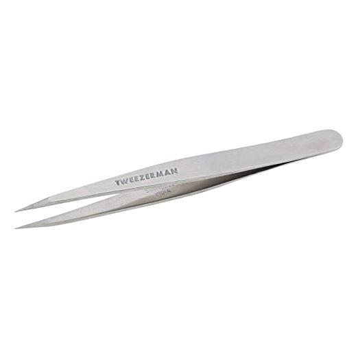 Stainless steel Tweezerman Point Tweezer Classic with precision tips for brow shaping and hair removal, shown in close-up.