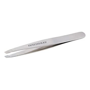 Stainless steel Tweezerman brow slant tip tweezer with precise angled tips for shaping eyebrows, shown on a white background.