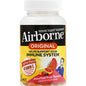 Assorted fruit-flavored Airborne Gummies immune support supplement by Pasteur Pharmacy in a clear plastic bottle.