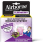 Airborne immune support supplement by Pasteur Pharmacy featuring elderberry effervescent tablets in a glass of water.