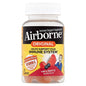 Airborne Original Very Berry immune support supplement bottle with label showing vitamins and supplement details.