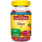 Nature Made Fiber supplement with orange and mixed berry flavor, 5g serving, in a bottle of vitamins and supplements.