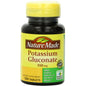 Nature Made Potassium Gluconate 550 Mg tablets in bottle, dietary supplement for healthy potassium intake.