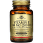 Solgar Vitamin E 200 IU softgels in a bottle, dietary supplement for antioxidant support, with 100 capsules.