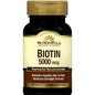 Windmill Biotin 5000 mcg supplement bottle from Pasteur Pharmacy, featuring label and cap, in a clean, well-lit setting.