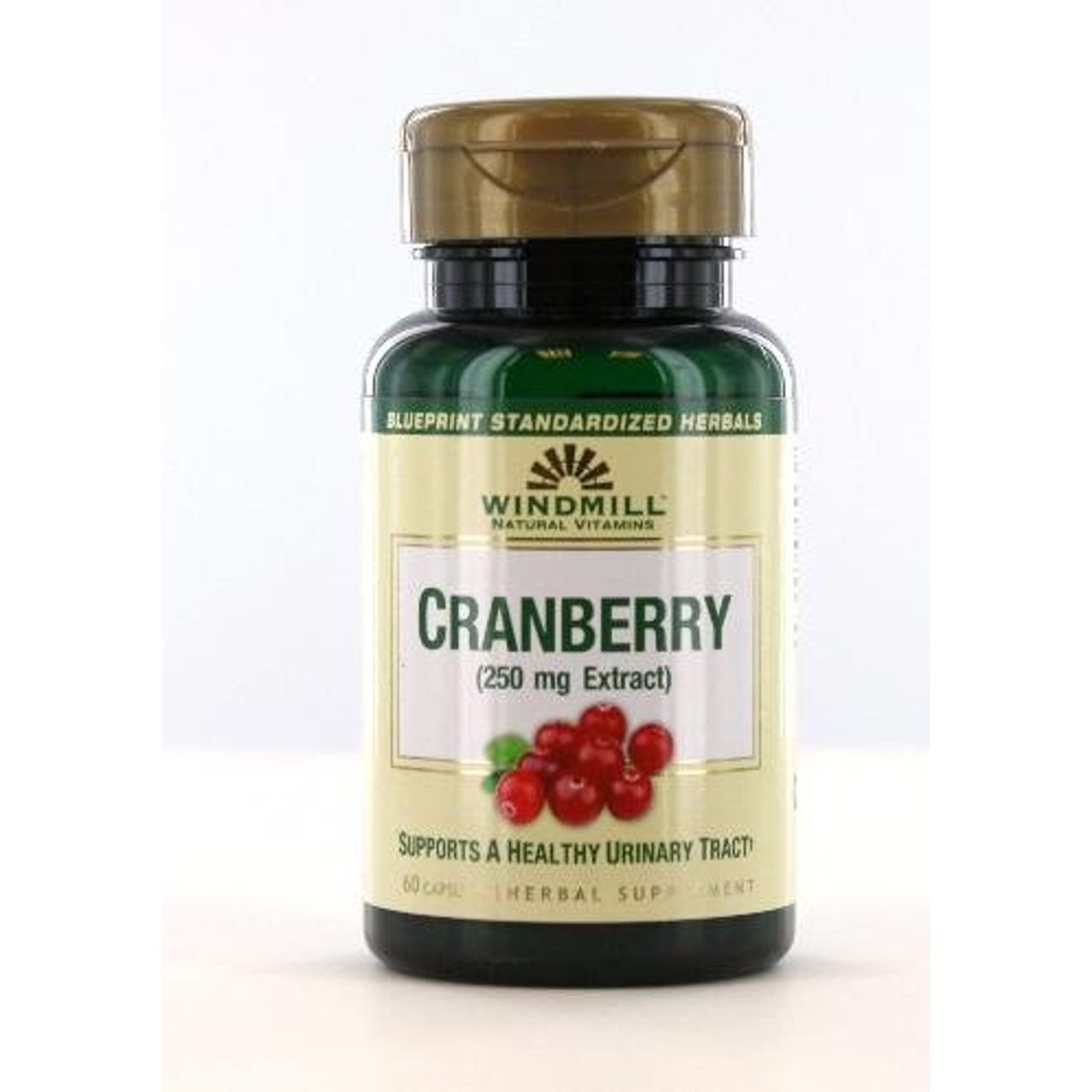 Bottle of Windmill Cranberry 250 mg extract capsules, dietary supplement in a clear container with a label showing cranberry imagery.