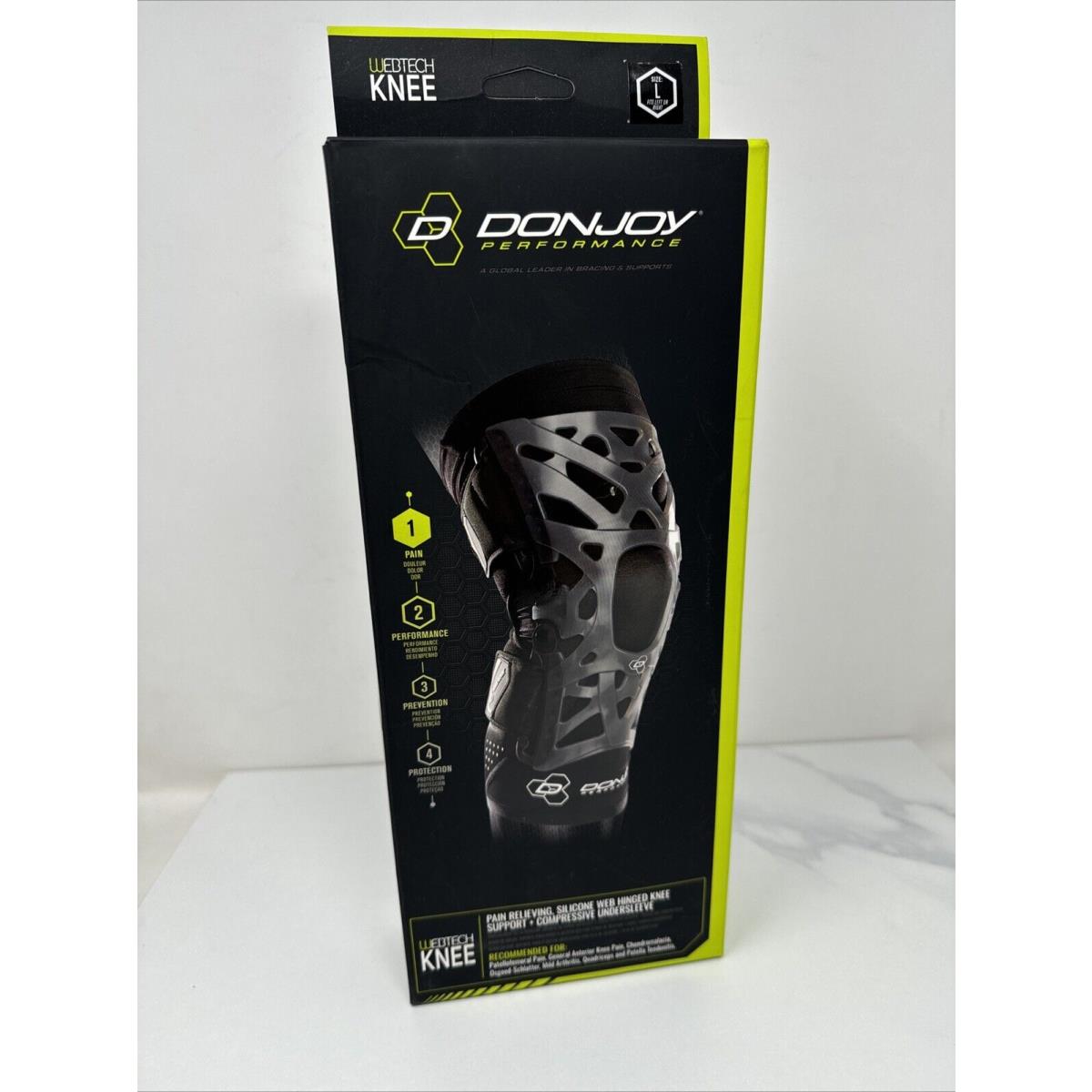 DonJoy Performance WEBTECH knee support brace with compression undersleeve in black, large size, designed for knee stabilization.