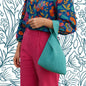 Japanese Knot Bag knit pattern by Darn Good Yarn, featuring eco-friendly design using recycled silk yarn.
