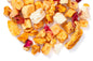 Loose leaf Peach Bellini tea by Novel Tea Book Shop, showcasing fresh peach-flavored tea leaves in a clear glass jar.