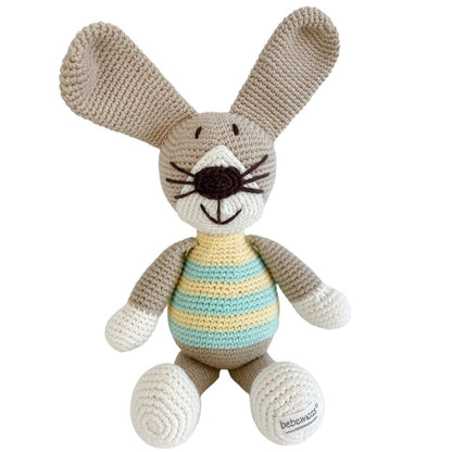 Green handmade stuffed rabbit named Pip by Bebemoss, made from organic cotton, soft and cuddly for children.