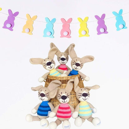 Limited edition handmade organic cotton stuffed rabbit named Pip, a soft and cuddly plush toy by Bebemoss.