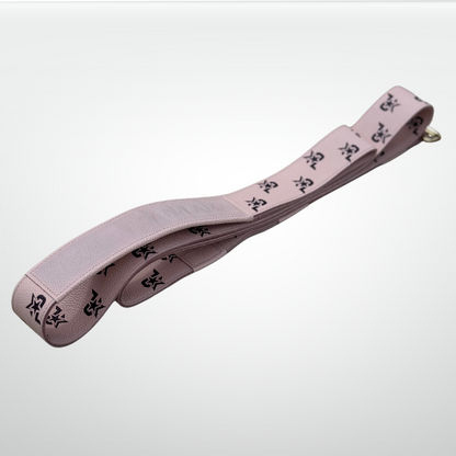 Pink I AM Leather Monogram Yoga Strap by iReliev for luxury fitness, featuring a sleek design and leather accents.
