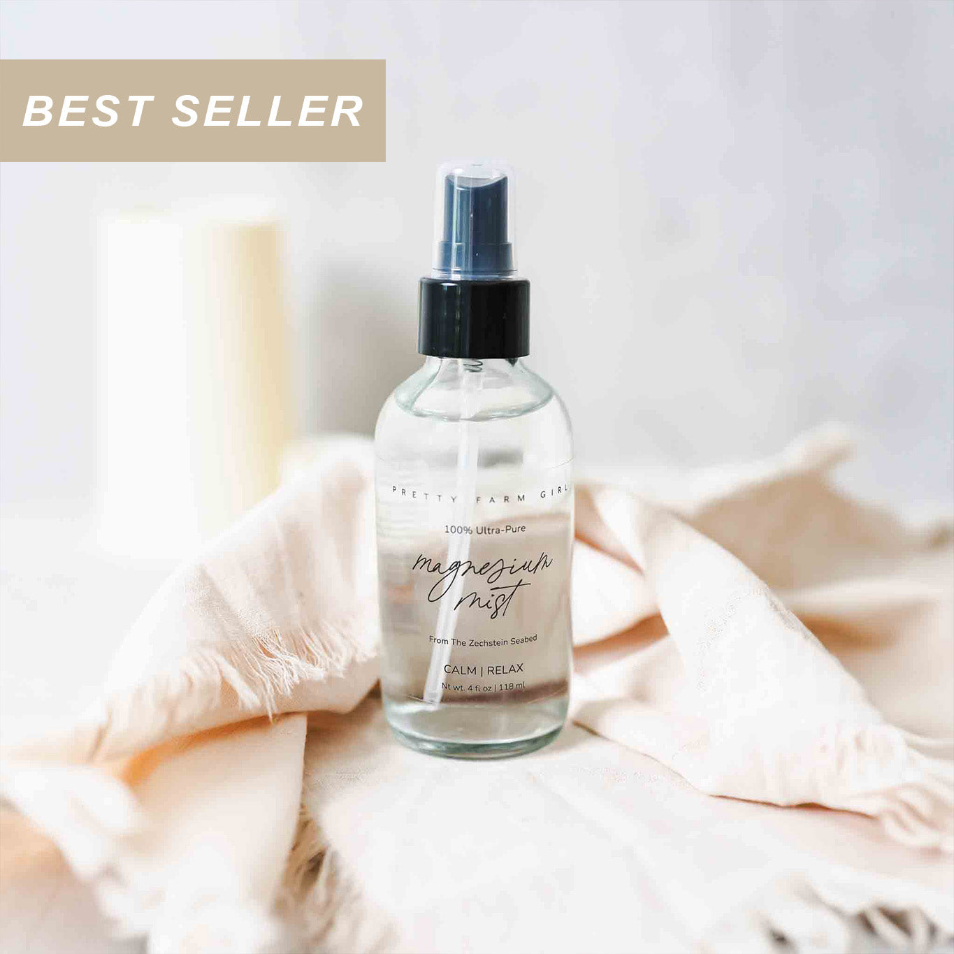 Pretty Farm Girl Magnesium Mist Body Spray toner in a spray bottle, designed for refreshing skin and relaxation.
