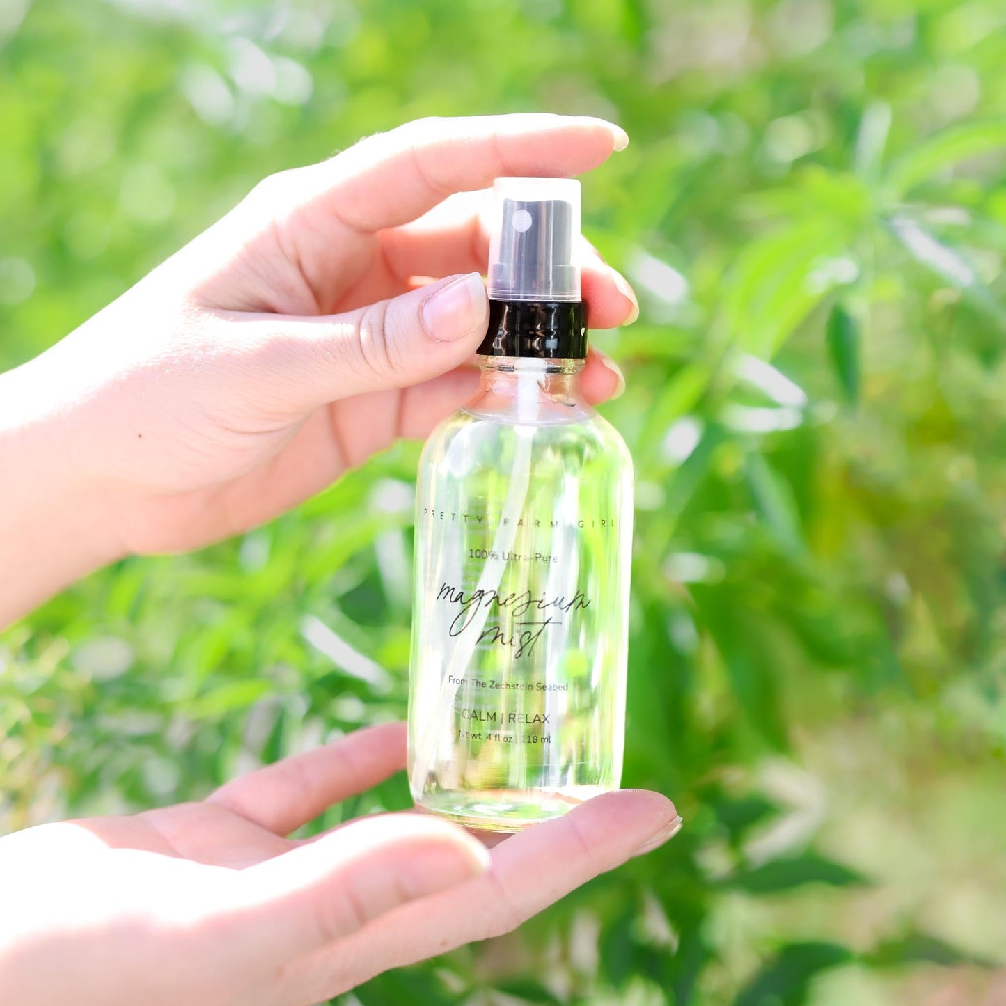 Pretty Farm Girl Magnesium Mist Body Spray toner bottle, natural lavender scent, with a spray nozzle and minimalist label design.