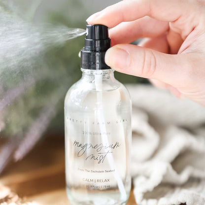 Pretty Farm Girl magnesium mist body spray toner in a spray bottle, designed for skin refreshment and relaxation.
