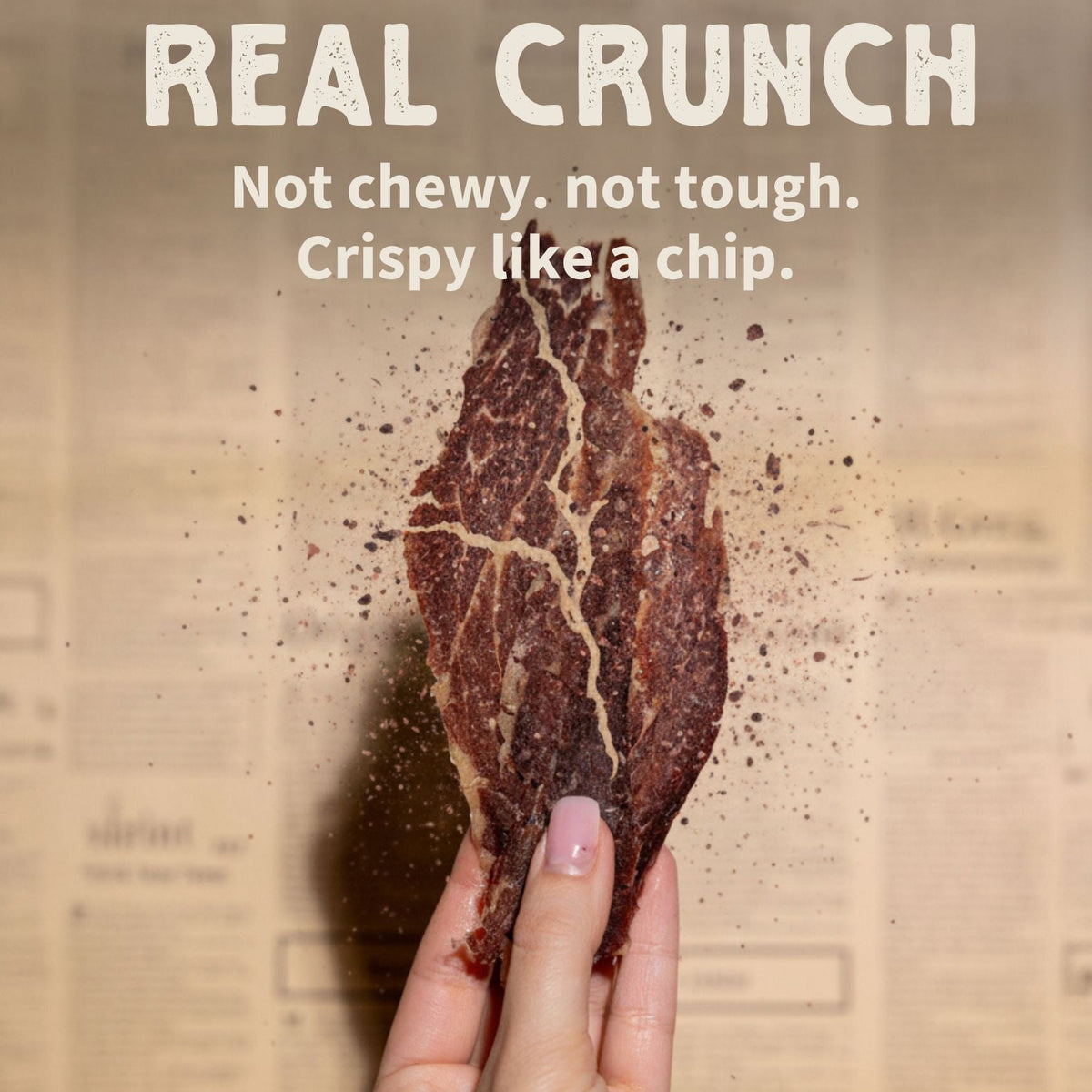 Primal Krisp 2 oz second cut brisket, showing a close-up of seasoned, cooked beef brisket slice with a smoky exterior.
