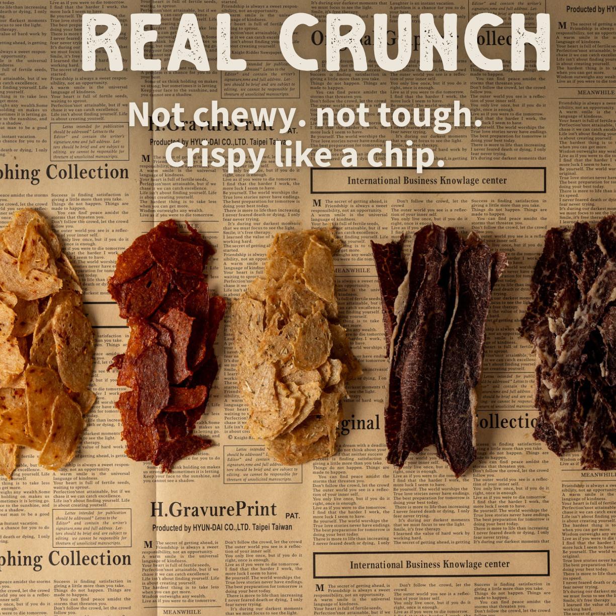 Primal Krisp BBQ Chicken snack bag showing crispy coated chicken pieces in a 2oz package.