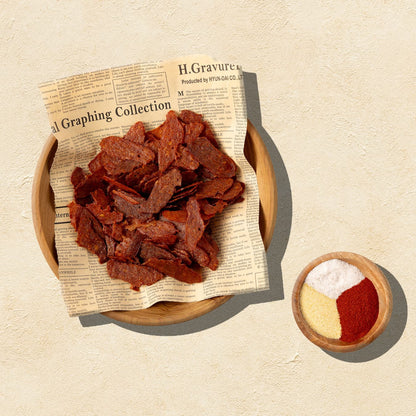 Primal Krisp BBQ chicken snack in 2oz bag, crispy and flavorful with smoky barbecue seasoning.
