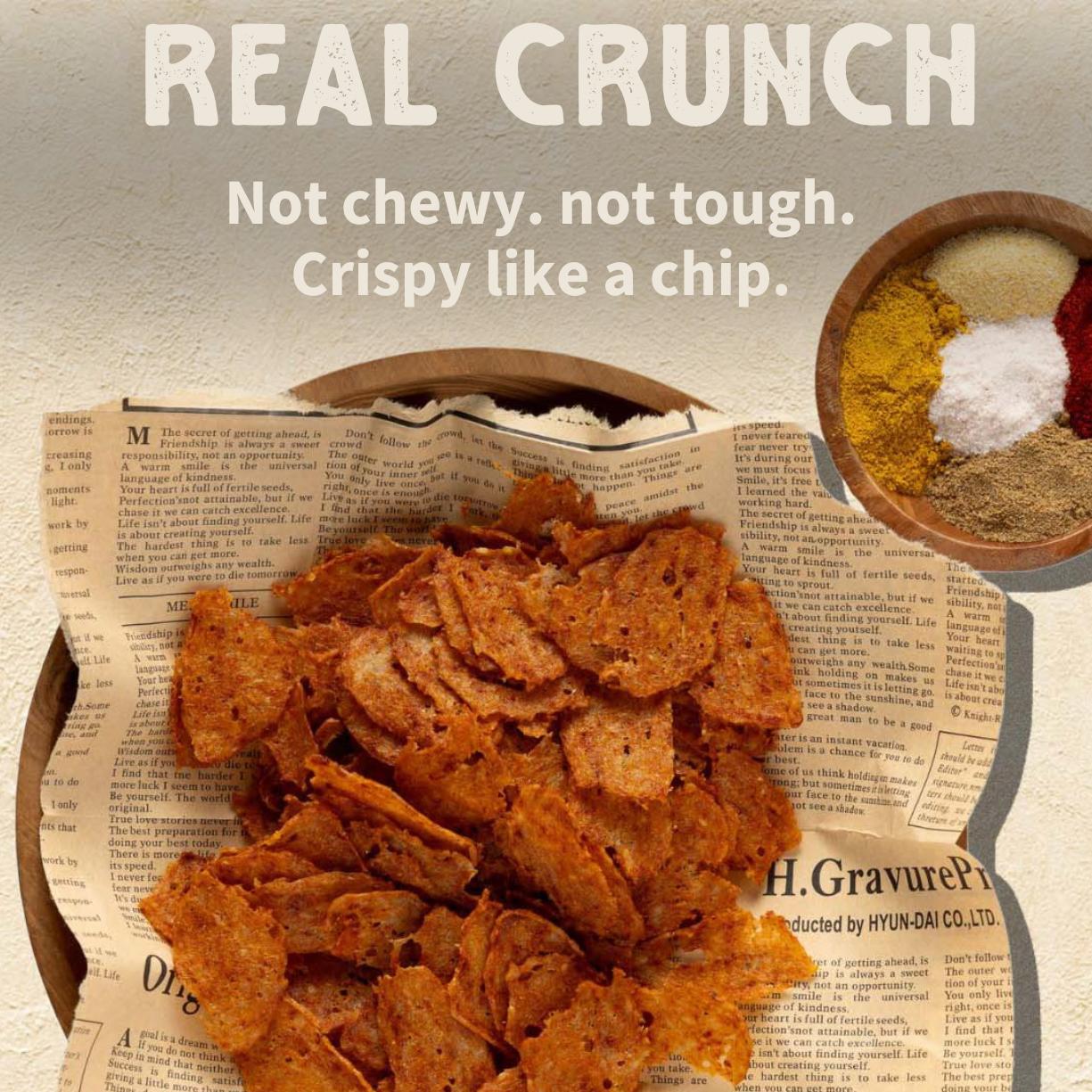 Primal Krisp Classic Chicken snack in 2oz package, crispy chicken strips with golden-brown texture, ready to enjoy.