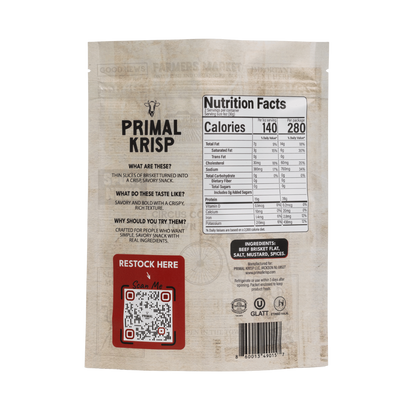 Primal Krisp Texas Heat 2oz container showing spicy snack with fiery Texas-style flavor and vibrant packaging.